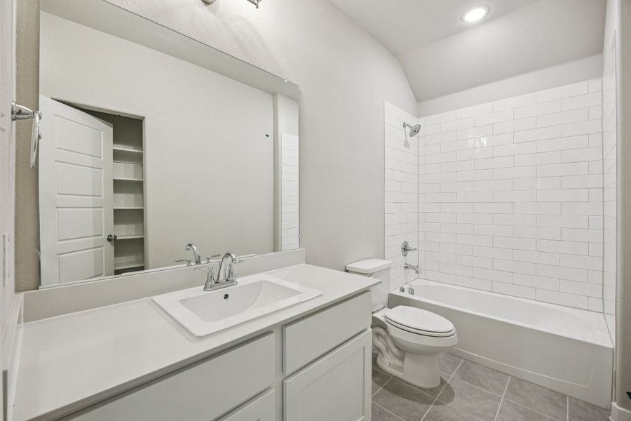 Bathroom in the Oscar home plan by Trophy Signature Homes – REPRESENTATIVE PHOTO Bathroom in the Oscar home plan by Trophy Signature Homes – REPRESENTATIVE PHOTO