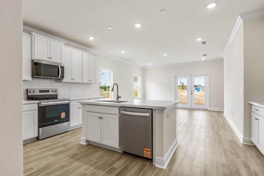 Furnished interior view inside a new home in Natureview, Freeport (Image 14).
