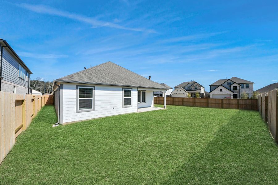 Experience outdoor living at its finest on this expansive covered patio, thoughtfully designed for BBQs and delightful outdoor dining Experience outdoor living at its finest on this expansive covered patio, thoughtfully designed for BBQs and delightful outdoor dining