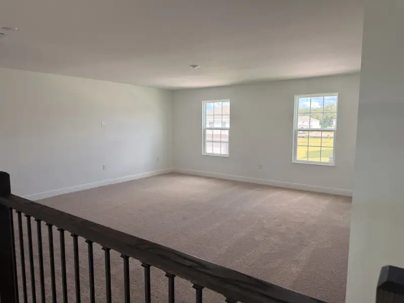Spacious, unfurnished interior of a new home in Bargrove Estates, Mount Dora (Image 4).