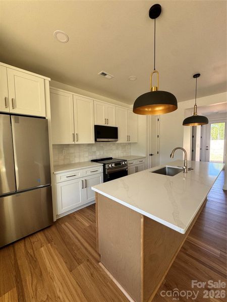 Furnished interior view inside a new home in , Charlotte (Image 3).
