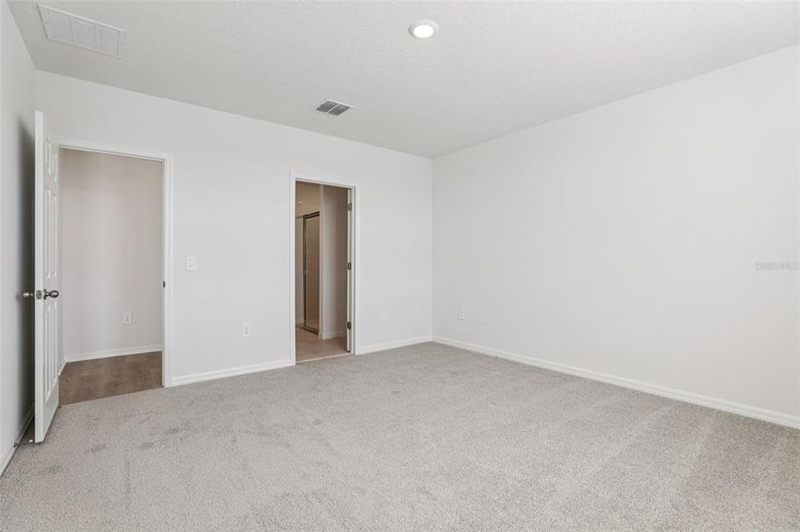 Spacious, unfurnished interior of a new home in Lake Deer Estates - Signature Series, Poinciana (Image 29).