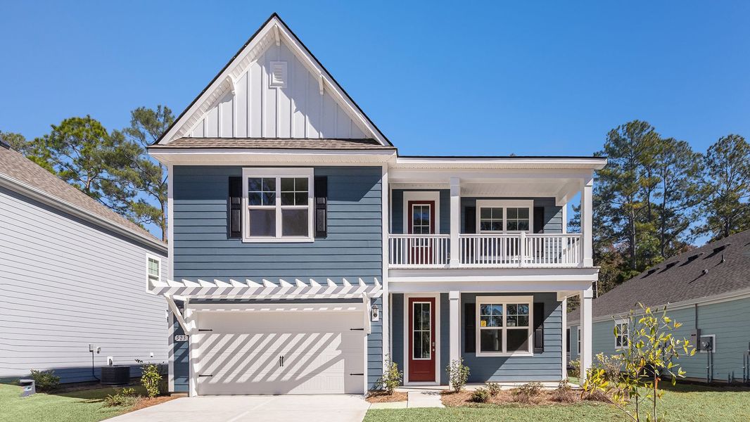 Representative exterior photo of a completed home built from the TILLMAN by D.R. Horton in Heron Pointe, Myrtle Beach, SC (Image 1).