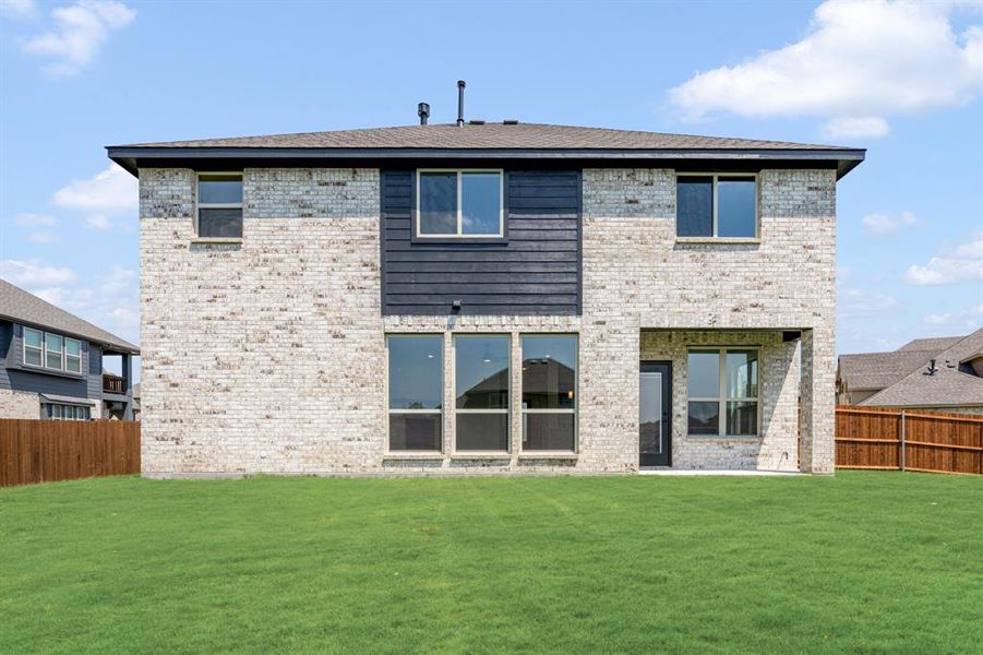 Front exterior of a new home in Trees Farm, DeSoto, TX, highlighting curb appeal (Image 1). Front exterior of a new home in Trees Farm, DeSoto, TX, highlighting curb appeal (Image 1).