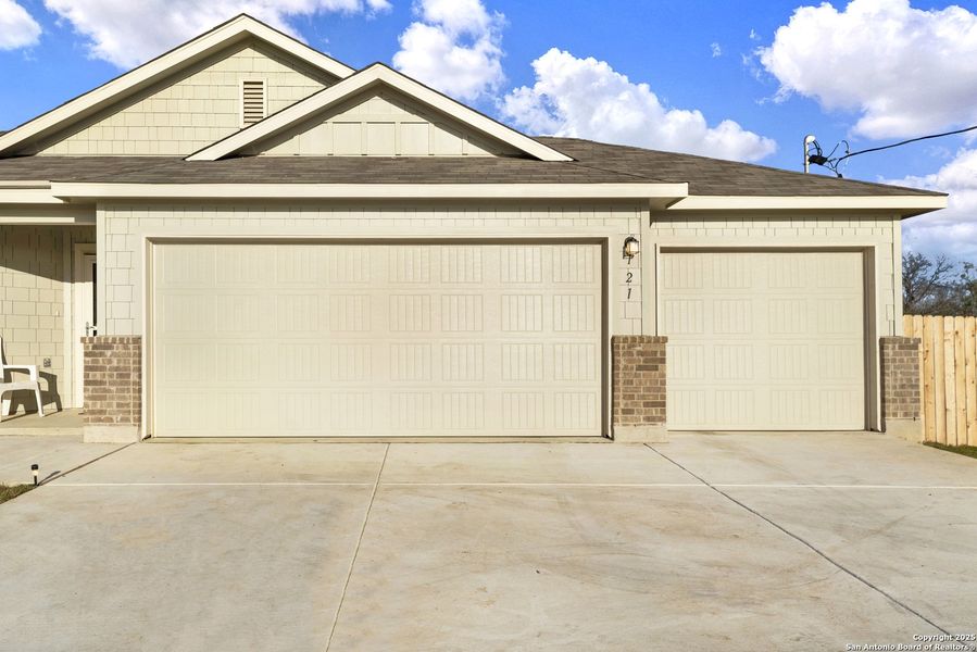 Front exterior of a new home in Chaparral Ranch, Floresville, TX, highlighting curb appeal (Image 29).