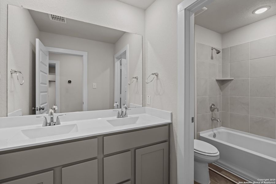 Furnished interior view inside a new home in Applewhite Meadows, San Antonio (Image 11). Furnished interior view inside a new home in Applewhite Meadows, San Antonio (Image 11).