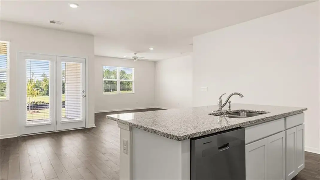 Furnished interior view inside a new home in Oakchase at Hampton, Hampton (Image 5).