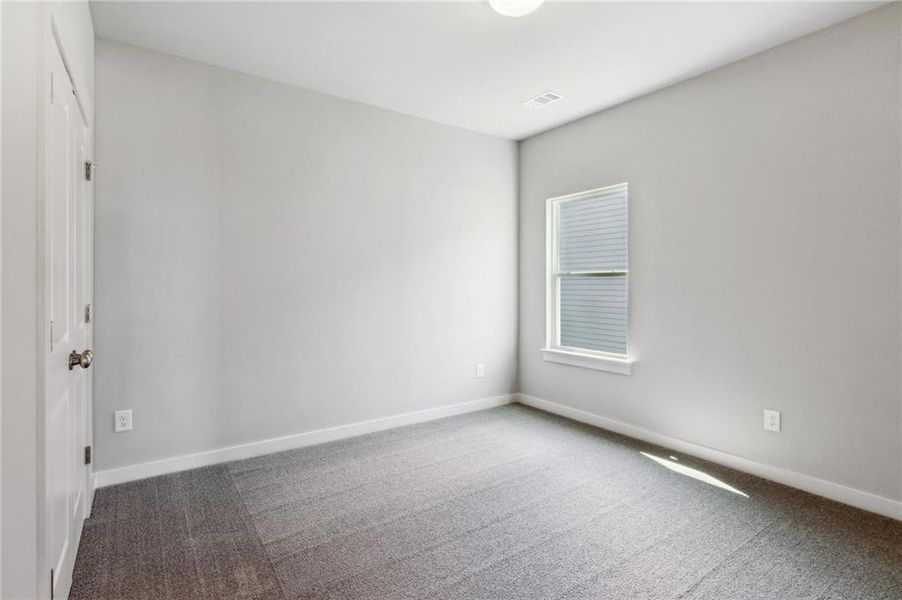 Spacious, unfurnished interior of a new home in Traditions of Braselton, Jefferson (Image 22).