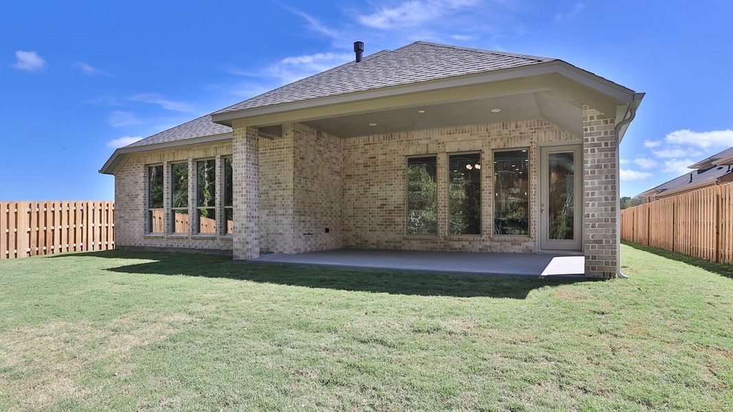 Front exterior of a new home in , Montgomery, TX, highlighting curb appeal (Image 1).