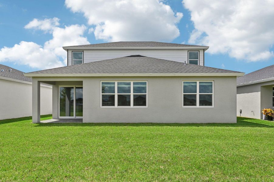 Front exterior of a new home in Brystol at Wylder - Reserve Series, Port St. Lucie, FL, highlighting curb appeal (Image 17).