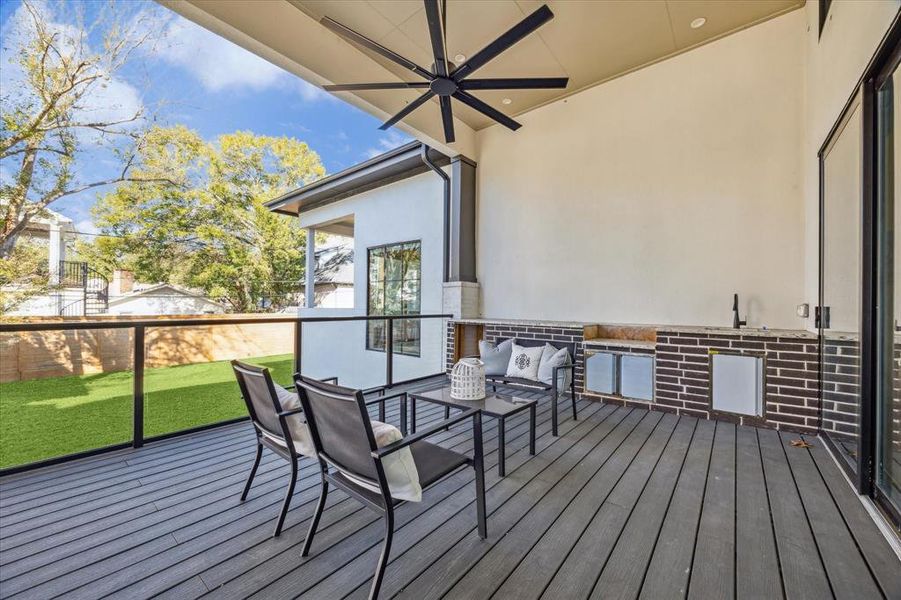 The first floor covered patio gives you tons of outdoor space and is prepped for an amazing summer kitchen!