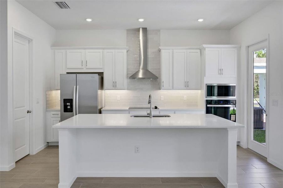 Furnished interior view inside a new home in Serenade at Ovation, Winter Garden (Image 4).