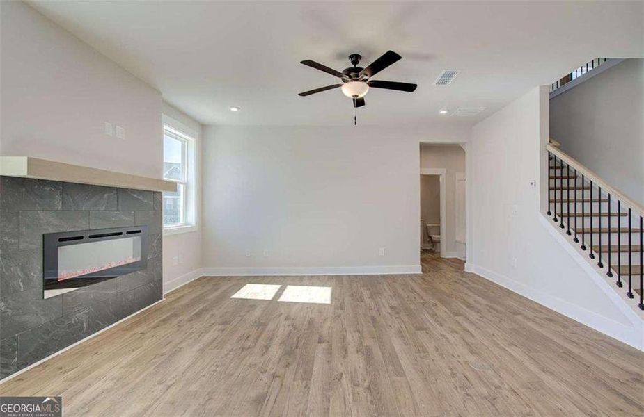 Spacious, unfurnished interior of a new home in The Paddocks at Doc Hughes, Buford (Image 47).