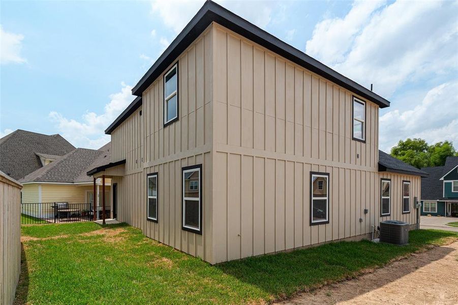 Front exterior of a new home in , Woodway, TX, highlighting curb appeal (Image 23). Front exterior of a new home in , Woodway, TX, highlighting curb appeal (Image 23).