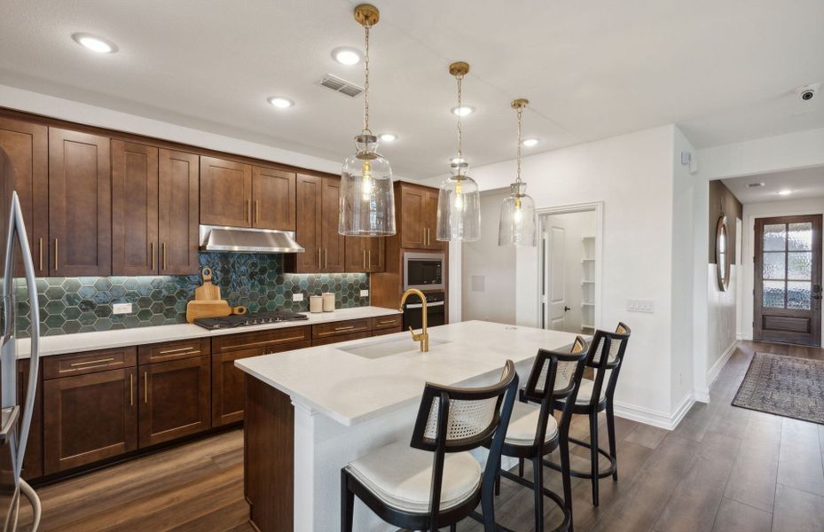 Spacious kitchen with recessed lighting