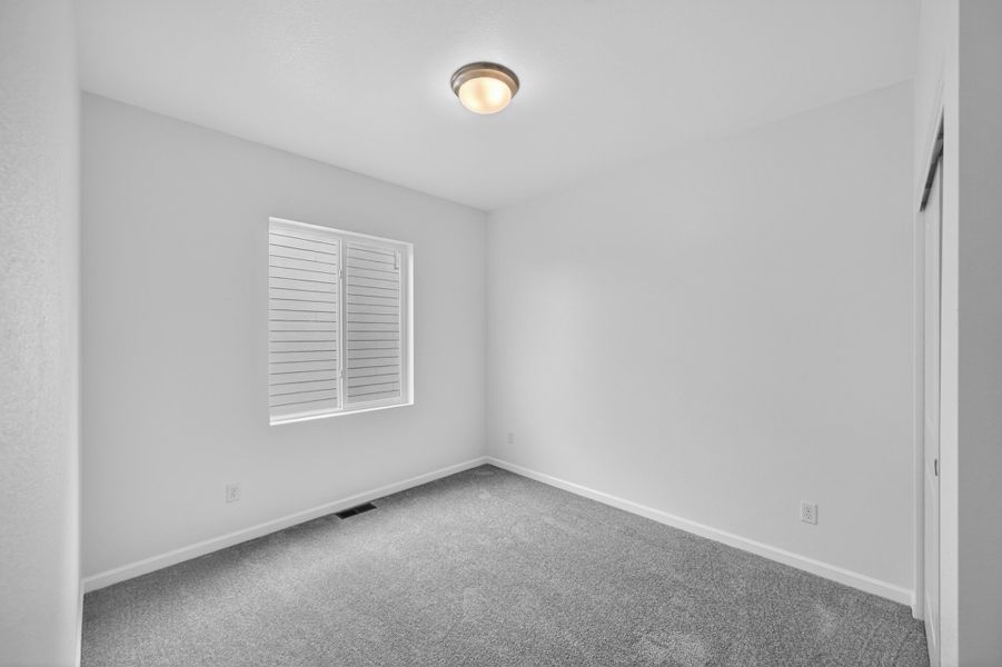 Spacious, unfurnished interior of a new home in Trailstone, Arvada (Image 24).