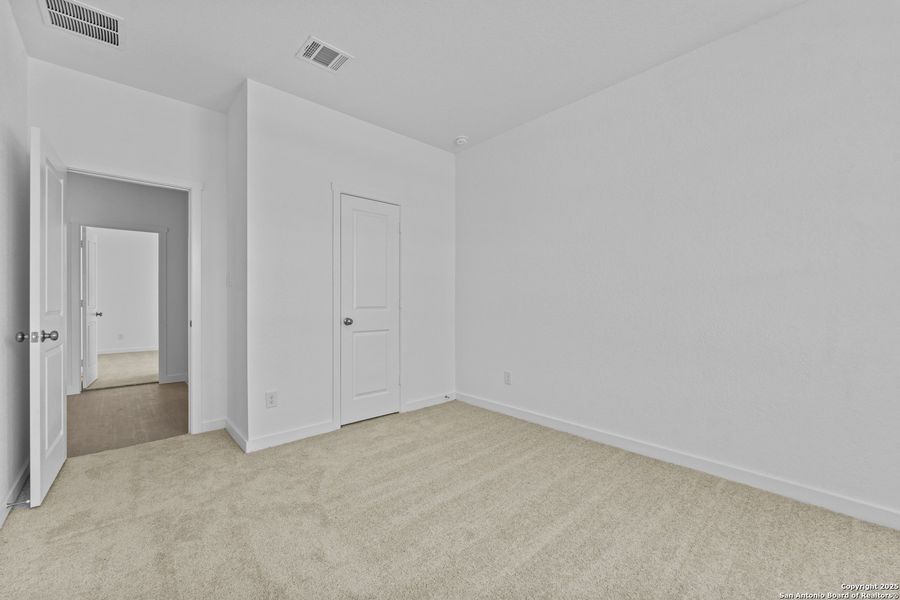 Spacious, unfurnished interior of a new home in Waterwheel: Coastline Collection, San Antonio (Image 12).