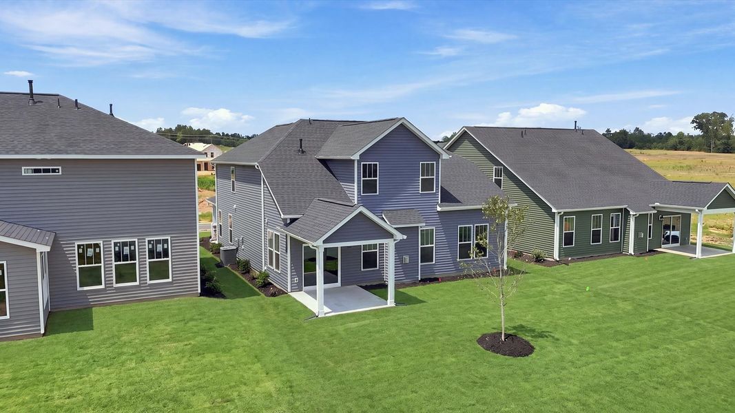 Established charm meets functional outdoor living with a spacious rear covered porch at the Harrier Point community Established charm meets functional outdoor living with a spacious rear covered porch at the Harrier Point community