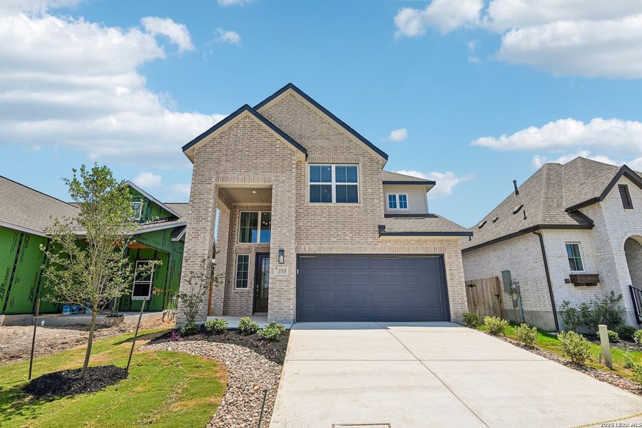 Front exterior of a new home in Legacy at Lake Dunlap, New Braunfels, TX, highlighting curb appeal (Image 21).
