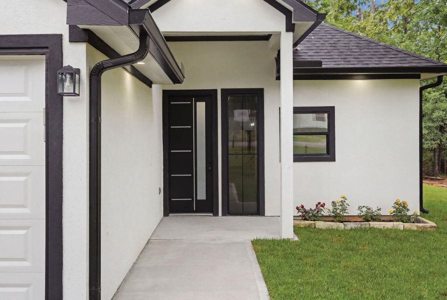 Exterior details and patio area of a home in , Willis (Image 22).