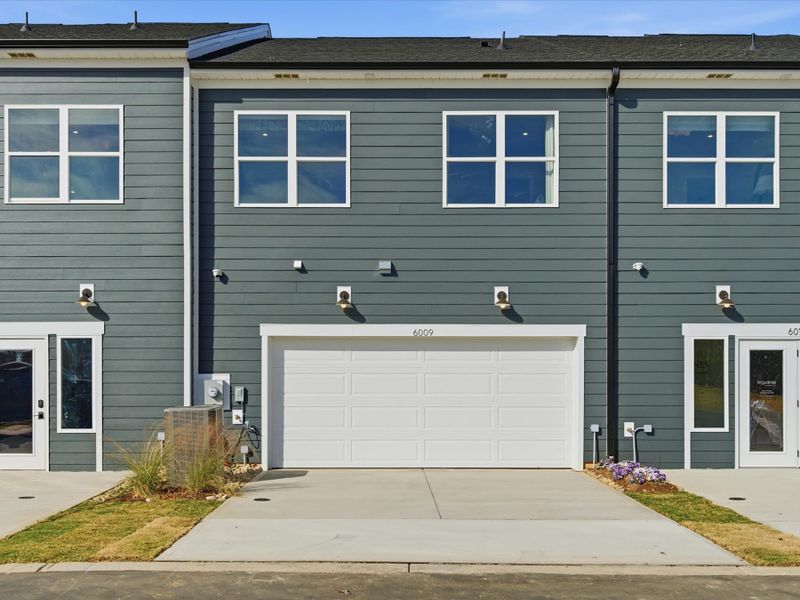 Representative exterior photo of a completed home built from the Avett by Tri Pointe Homes in Ellis Townes, Charlotte, NC (Image 2). Representative exterior photo of a completed home built from the Avett by Tri Pointe Homes in Ellis Townes, Charlotte, NC (Image 2).