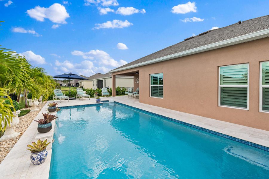Exterior details and patio area of a home in Grande Hammock, Vero Beach (Image 3). Exterior details and patio area of a home in Grande Hammock, Vero Beach (Image 3).