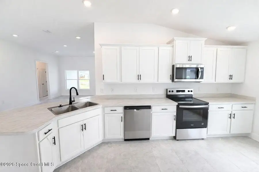 Furnished interior view inside a new home in St. John's Preserve, Palm Bay (Image 3).
