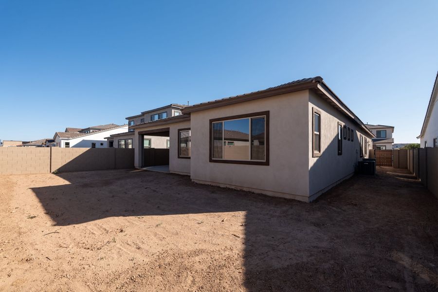 Exterior details and patio area of a home in Waterston Central, Gilbert (Image 3).