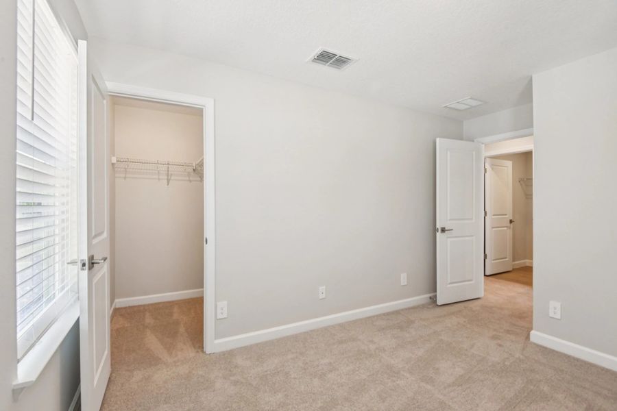 Spacious walk-in closet off bedroom 2
