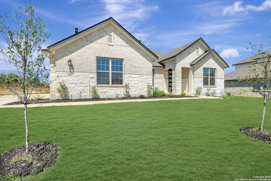 Front exterior of a new home in Preserve at Annabelle Ranch, San Antonio, TX, highlighting curb appeal (Image 13).