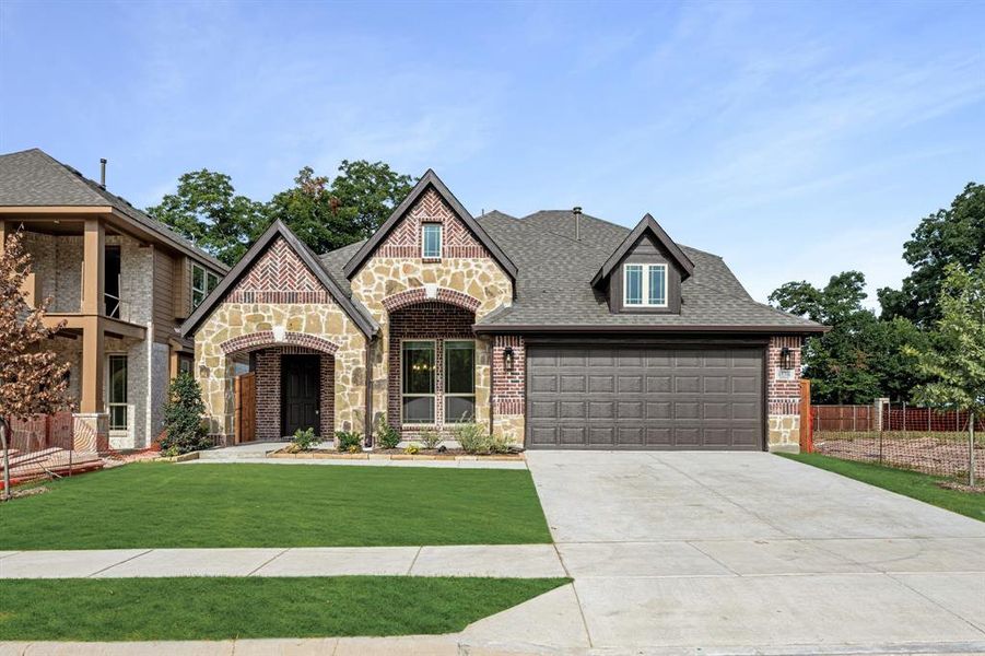 Front exterior of a new home in East Oak Creek 50-55, Commerce, TX, highlighting curb appeal (Image 27).