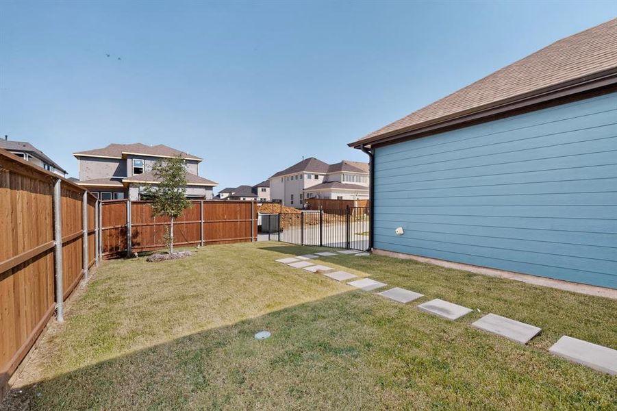 Exterior details and patio area of a home in , Rowlett (Image 25).