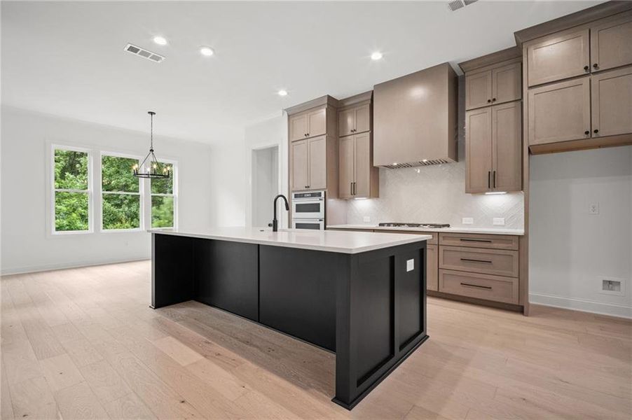 Furnished interior view inside a new home in Lakeside at River Green, Canton (Image 11).