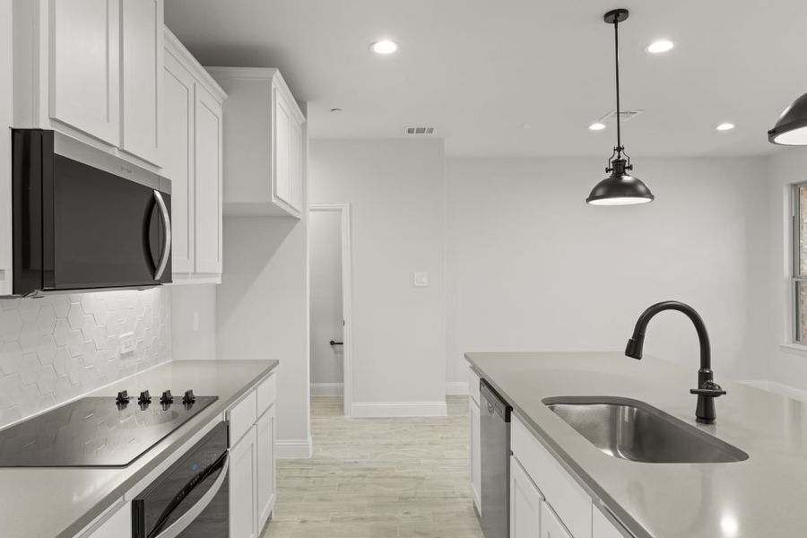 Front exterior of a new home in Sereno Oaks at Buckner Terrace, Dallas, TX, highlighting curb appeal (Image 8). Front exterior of a new home in Sereno Oaks at Buckner Terrace, Dallas, TX, highlighting curb appeal (Image 8).