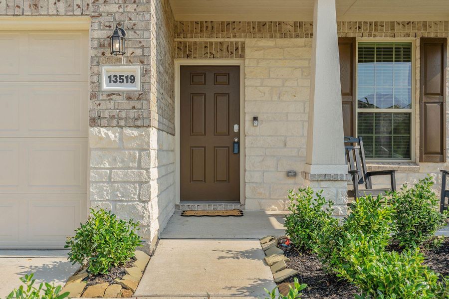 Front exterior of a new home in Myrtle Gardens, Magnolia, TX, highlighting curb appeal (Image 19). Front exterior of a new home in Myrtle Gardens, Magnolia, TX, highlighting curb appeal (Image 19).