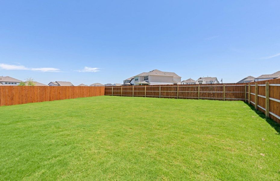 Exterior details and patio area of a home in Santa Rita Ranch, Liberty Hill (Image 3).