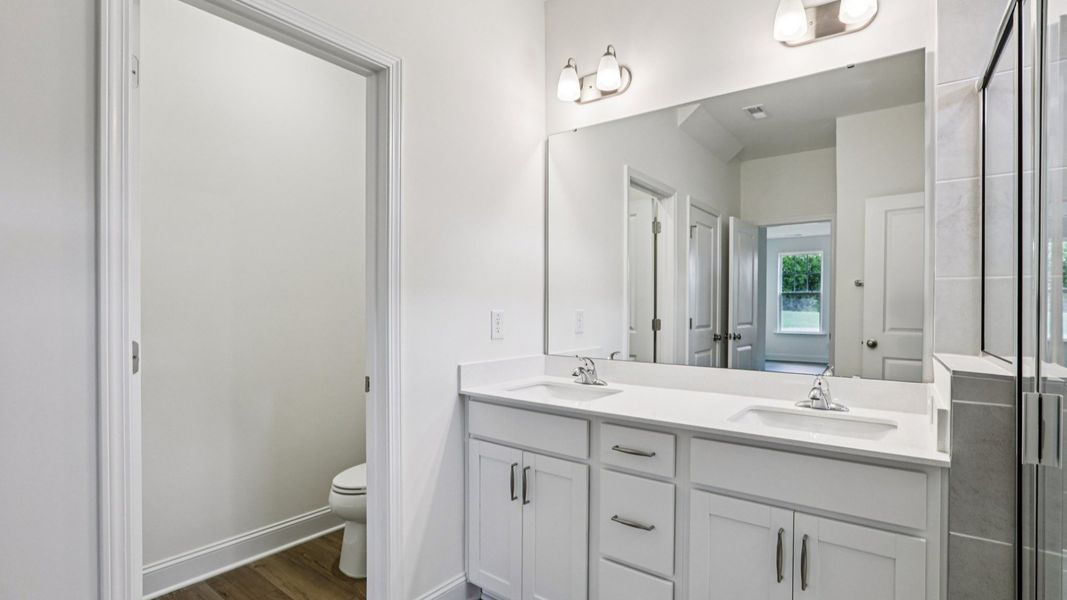 Furnished interior view inside a new home in Whispering Pines, Franklinton (Image 16).