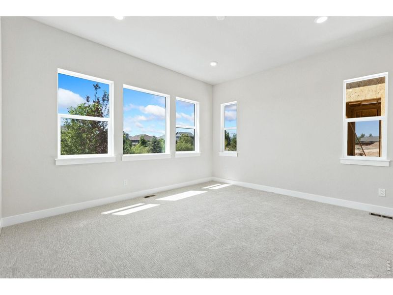 Spacious, unfurnished interior of a new home in RainDance, Windsor (Image 8).