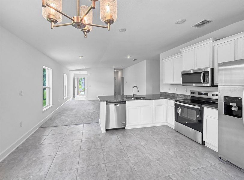 Furnished interior view inside a new home in Harmony Central, St. Cloud (Image 7).