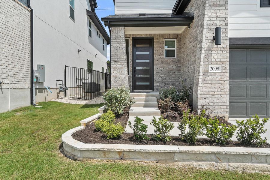 Exterior details and patio area of a home in Foxfield, Austin (Image 4). Exterior details and patio area of a home in Foxfield, Austin (Image 4).