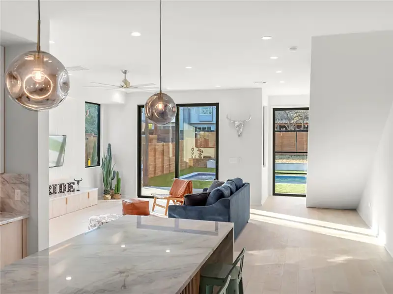 Dining space featuring recessed lighting, ceiling fan, and light wood-type flooring Dining space featuring recessed lighting, ceiling fan, and light wood-type flooring