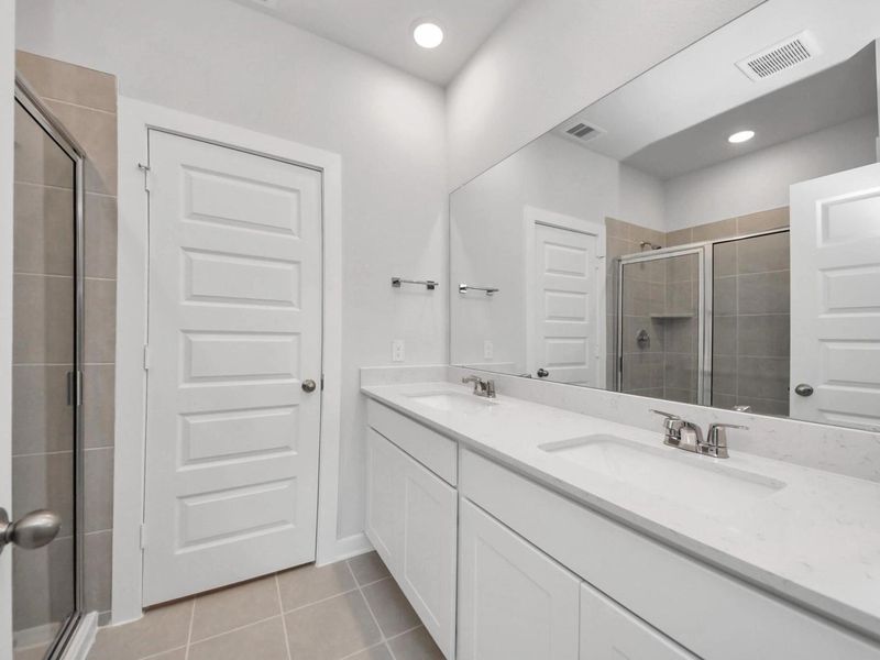 Furnished interior view inside a new home in Caney Creek Place, Conroe (Image 15).