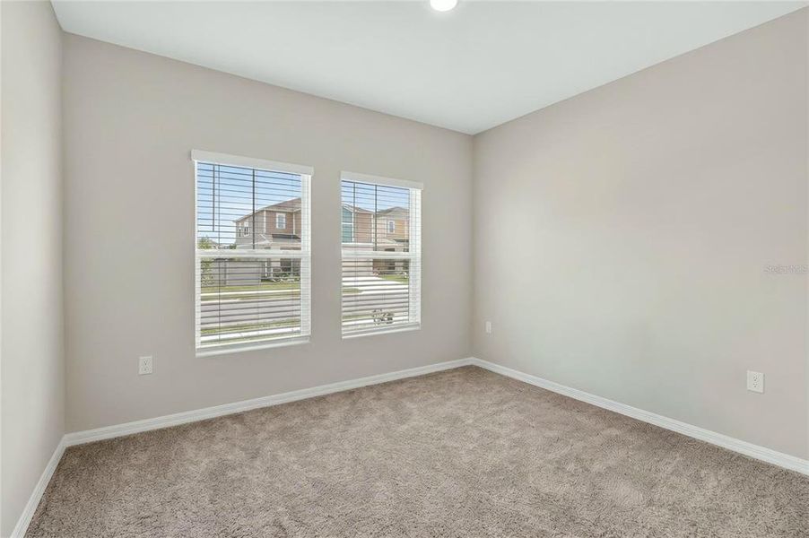 Spacious, unfurnished interior of a new home in Scenic Terrace, Haines City (Image 21).