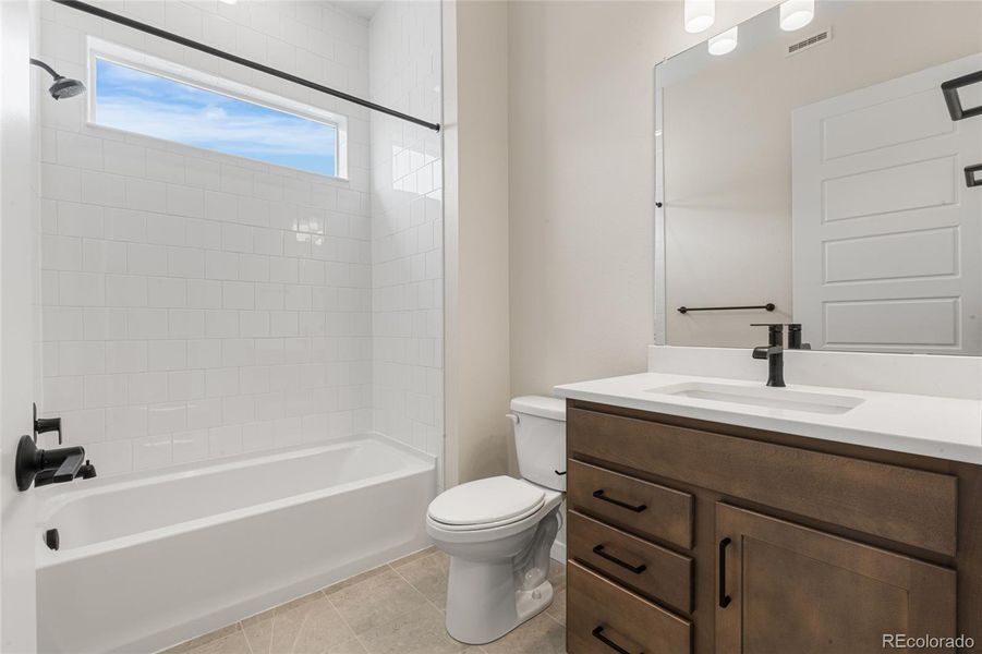 Furnished interior view inside a new home in Hilltop at Inspiration, Aurora (Image 8).