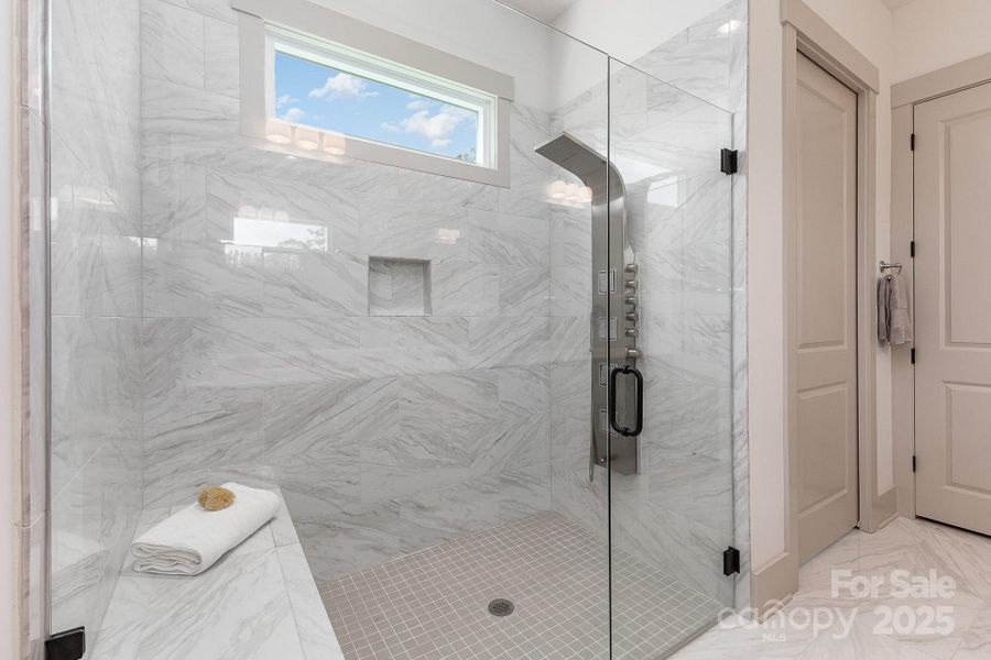 Large zero entry shower with bench Large zero entry shower with bench