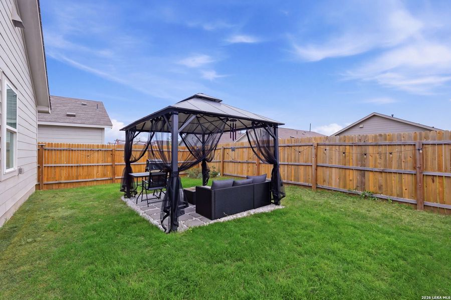 Exterior details and patio area of a home in Spring Grove, St. Hedwig (Image 22).