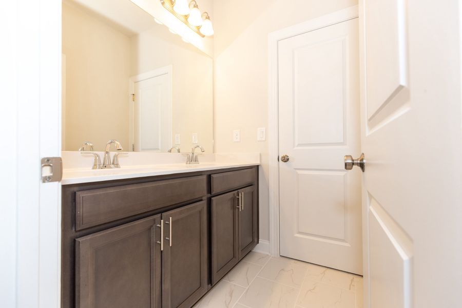 Representative furnished interior of a home built from the The Owens by The Providence Group in Waterhaven, Cumming (Image 34).