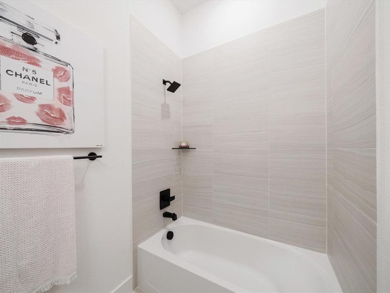 Full bath featuring shower / bathtub combination Full bath featuring shower / bathtub combination