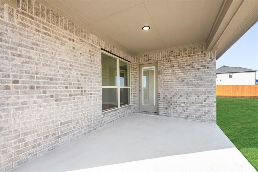 Exterior details and patio area of a home in Sunrise at Garden Valley, Waxahachie (Image 26).