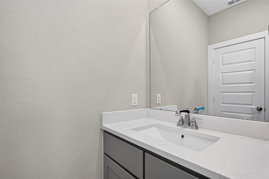 Secondary bathroom 2 upstairs has 2 separate vanity areas.